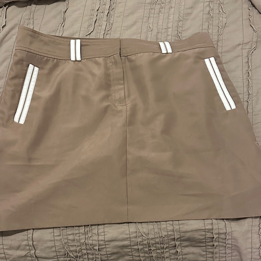 Izod Brown  Skirt with White Details… shorts built in.  Golf skirt?  Super cute